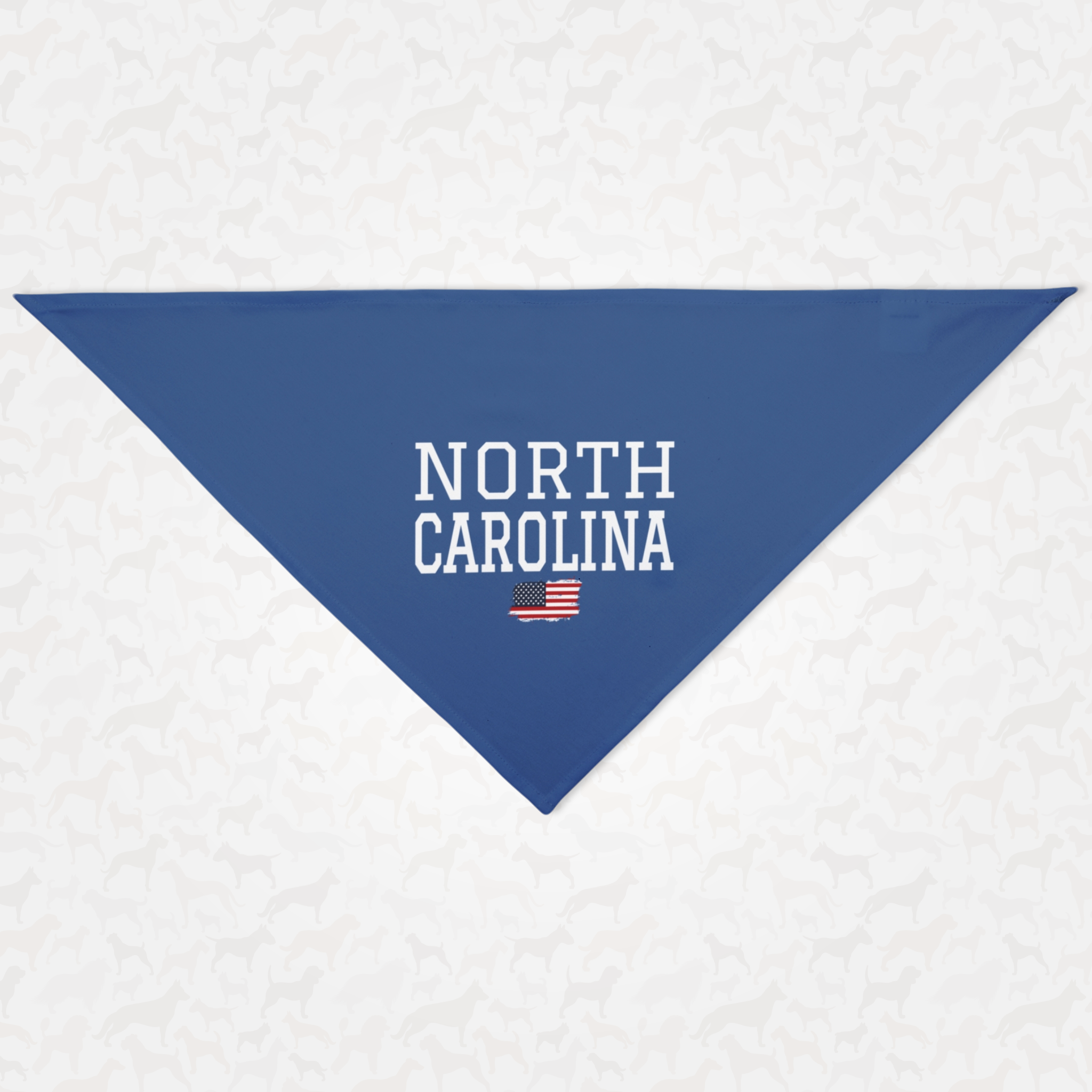 Blue dog bandana saying "North Carolina" in varsity font along with USA flag graphic underneath.