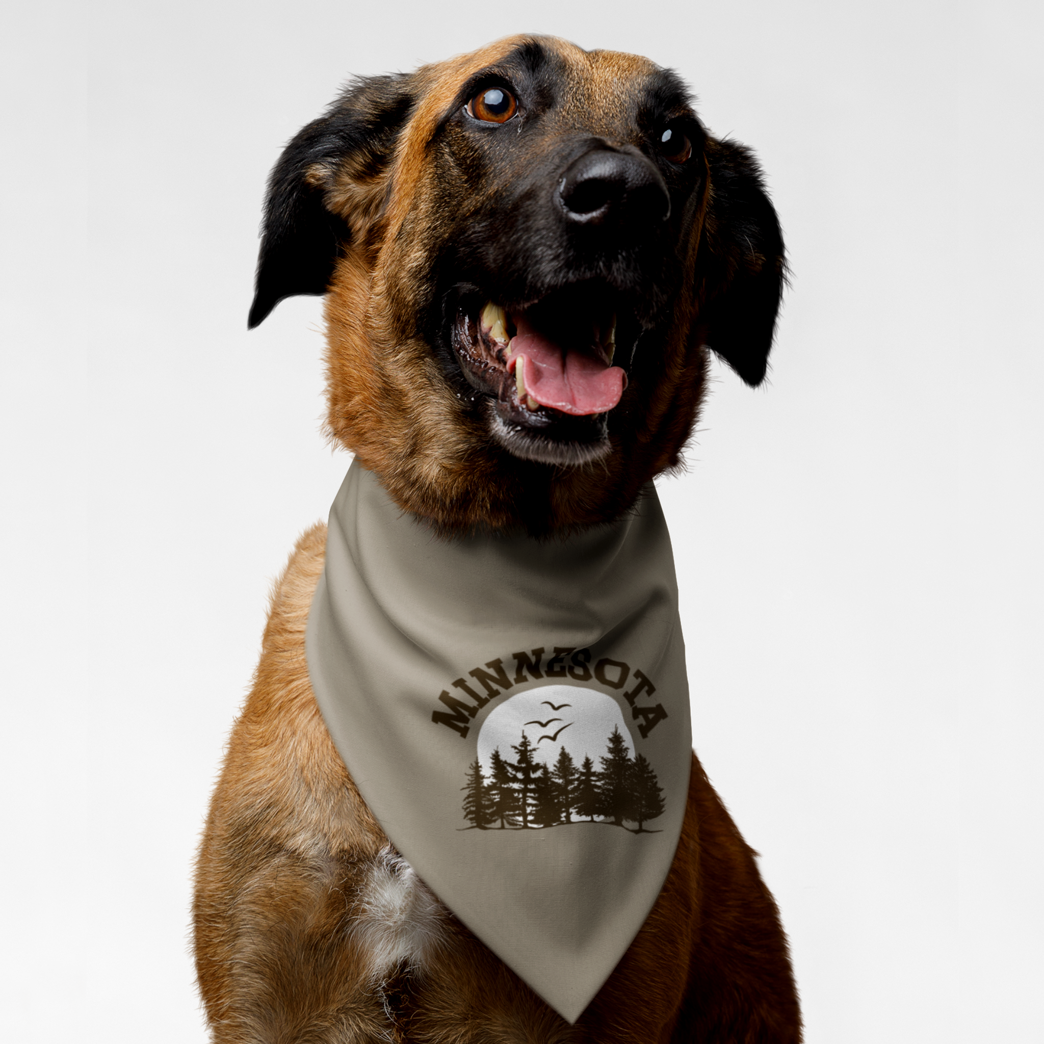 Dog wearing bandana saying "Minnesota" along with a nature tree line graphic.