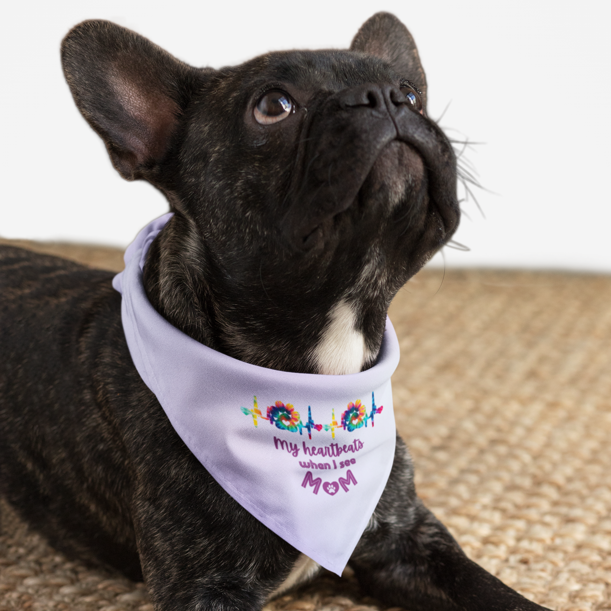 Dog wearing cute pink bandana featuring paw heartbeat graphic saying My Heartbeats When I See Mom.