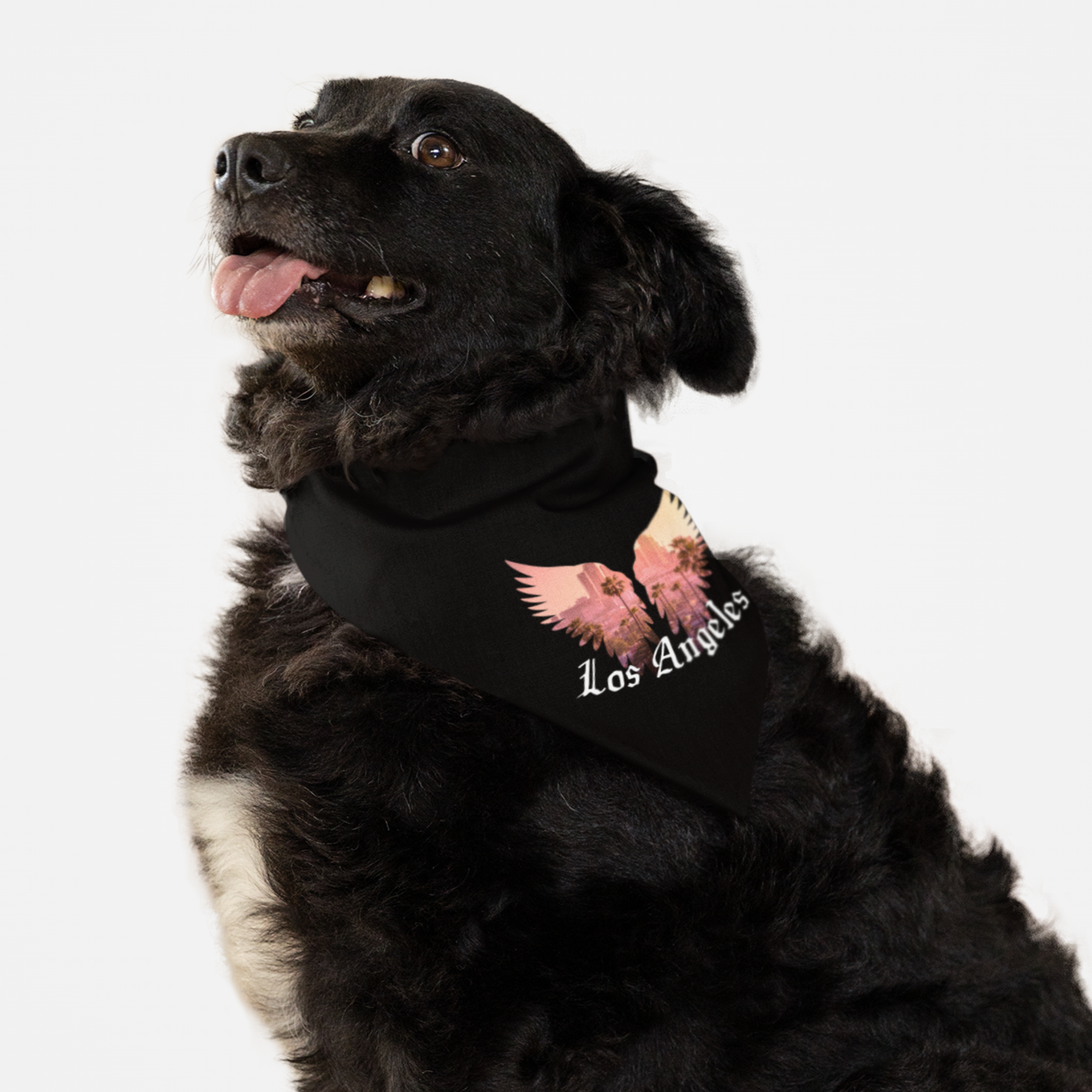 Dog wearing Los Angeles bandana featuring a downtown skyline sunset image in angel wings.