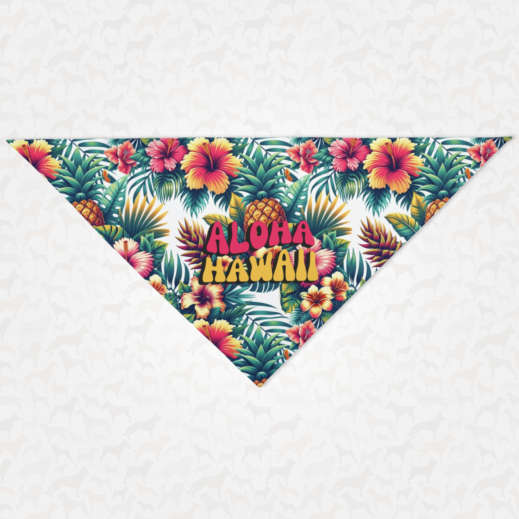 Exotic dog bandana featuring flowers and pineapples graphics saying Aloha Hawaii.