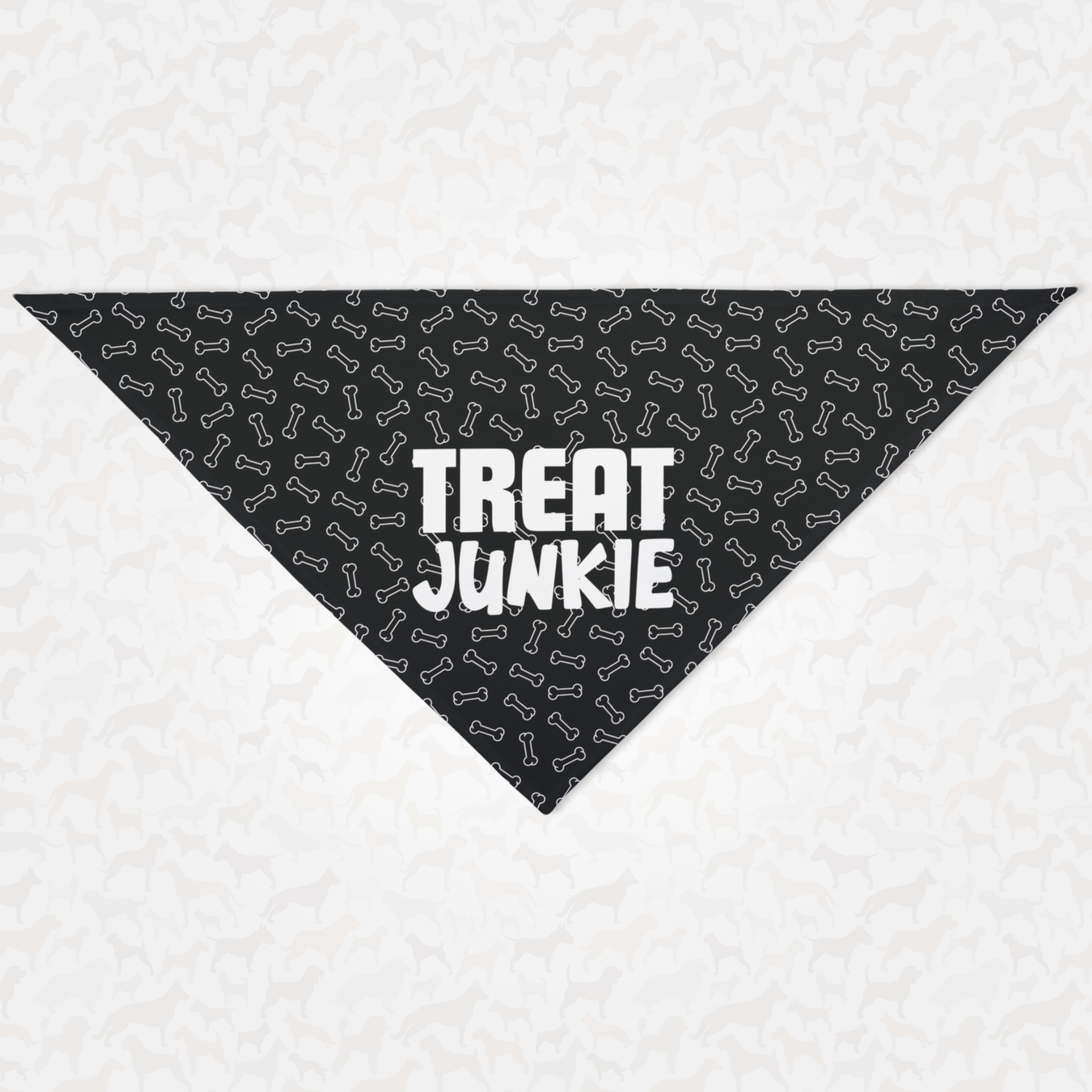 Funny dog bandana with bones pattern saying Treat Junkie.