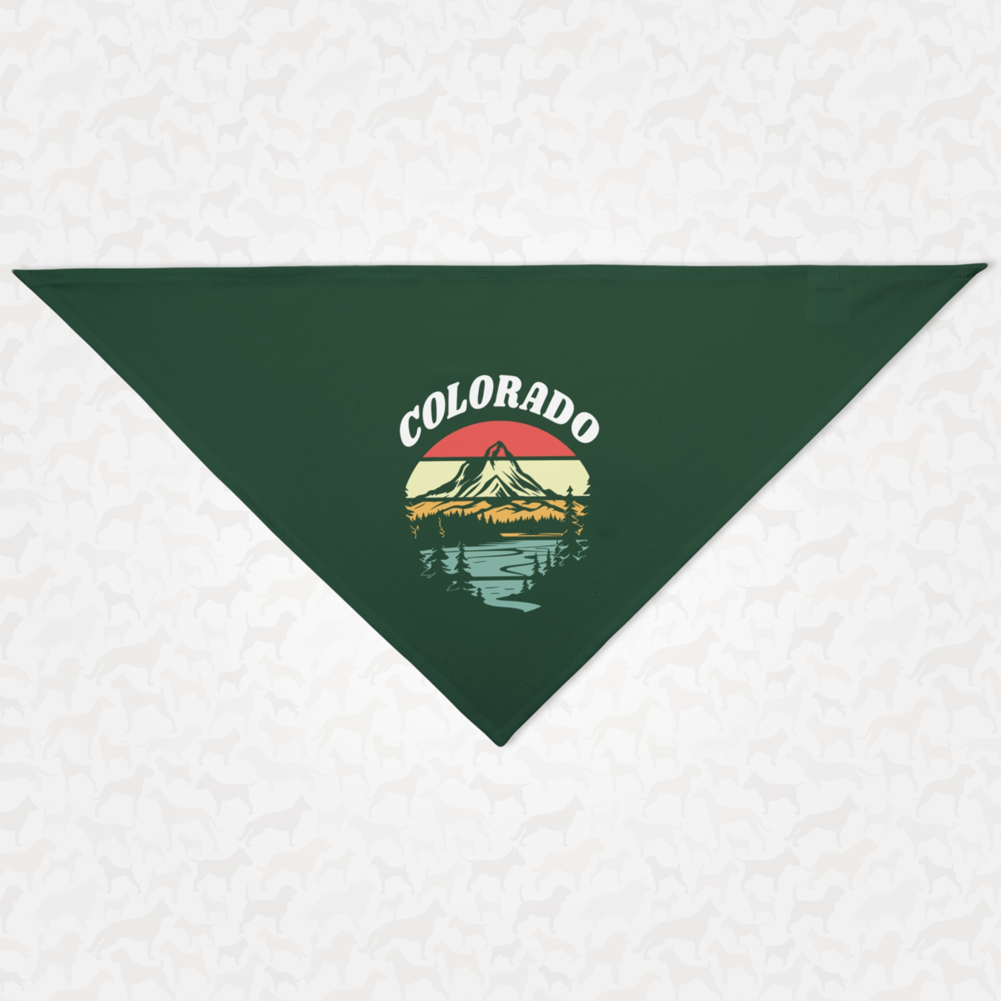 Green dog bandana with retro nature landscape graphic saying Colorado.
