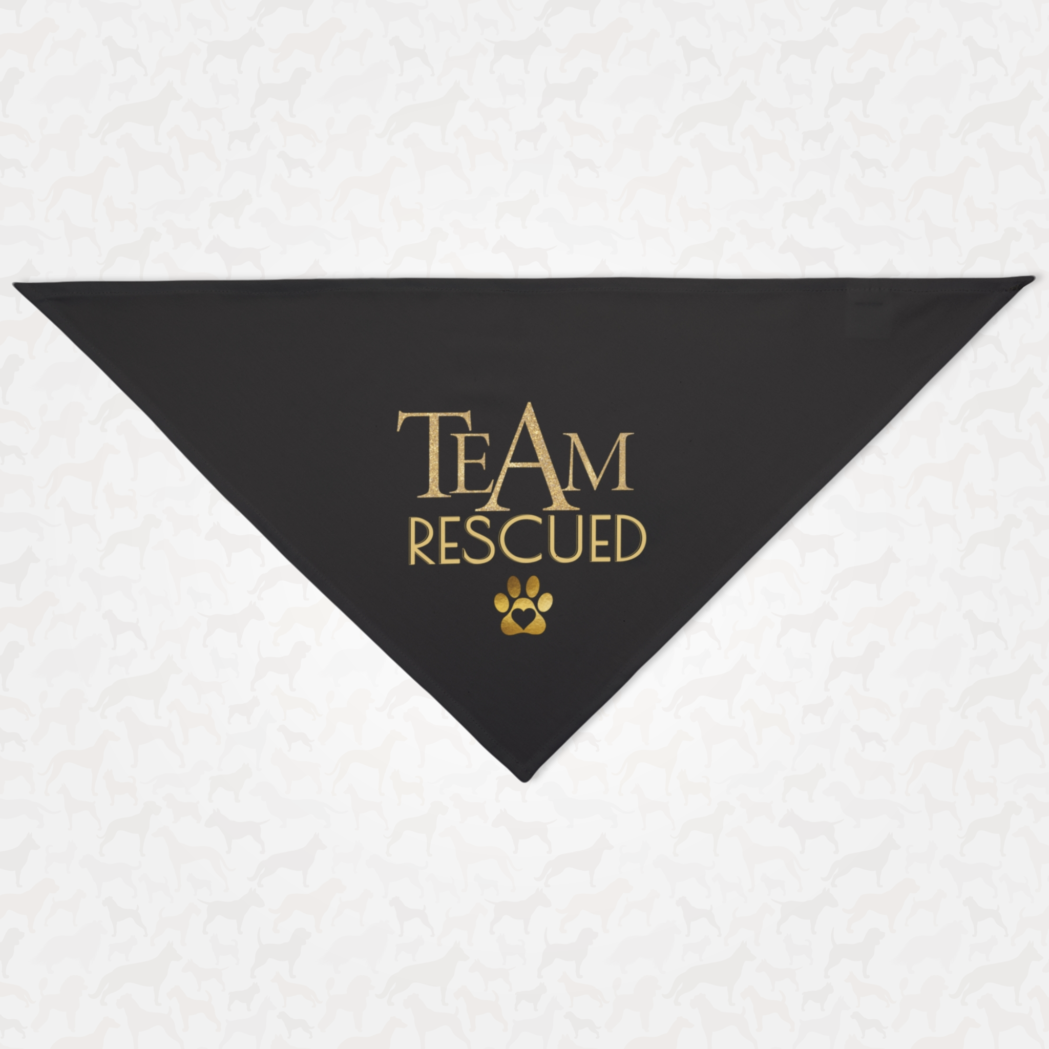 Adoption awareness dog bandana saying "Team Rescued" in gold elegant serif font.