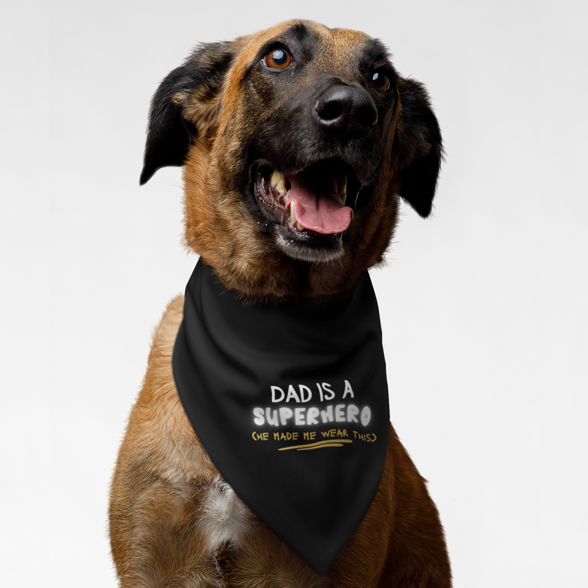 Brown dog wearing a funny and cute dog bandana with Dad Is A Superhero slogan printed on it.