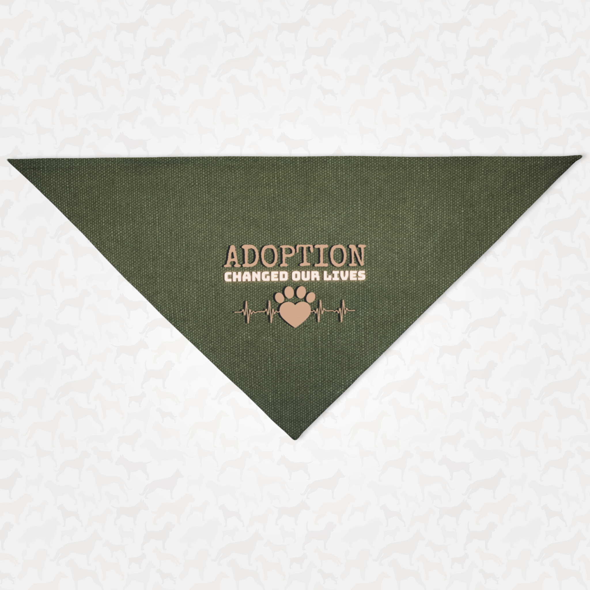 Dog bandana with cute paw and heartbeat graphic saying Adoption Changed Our Lives.