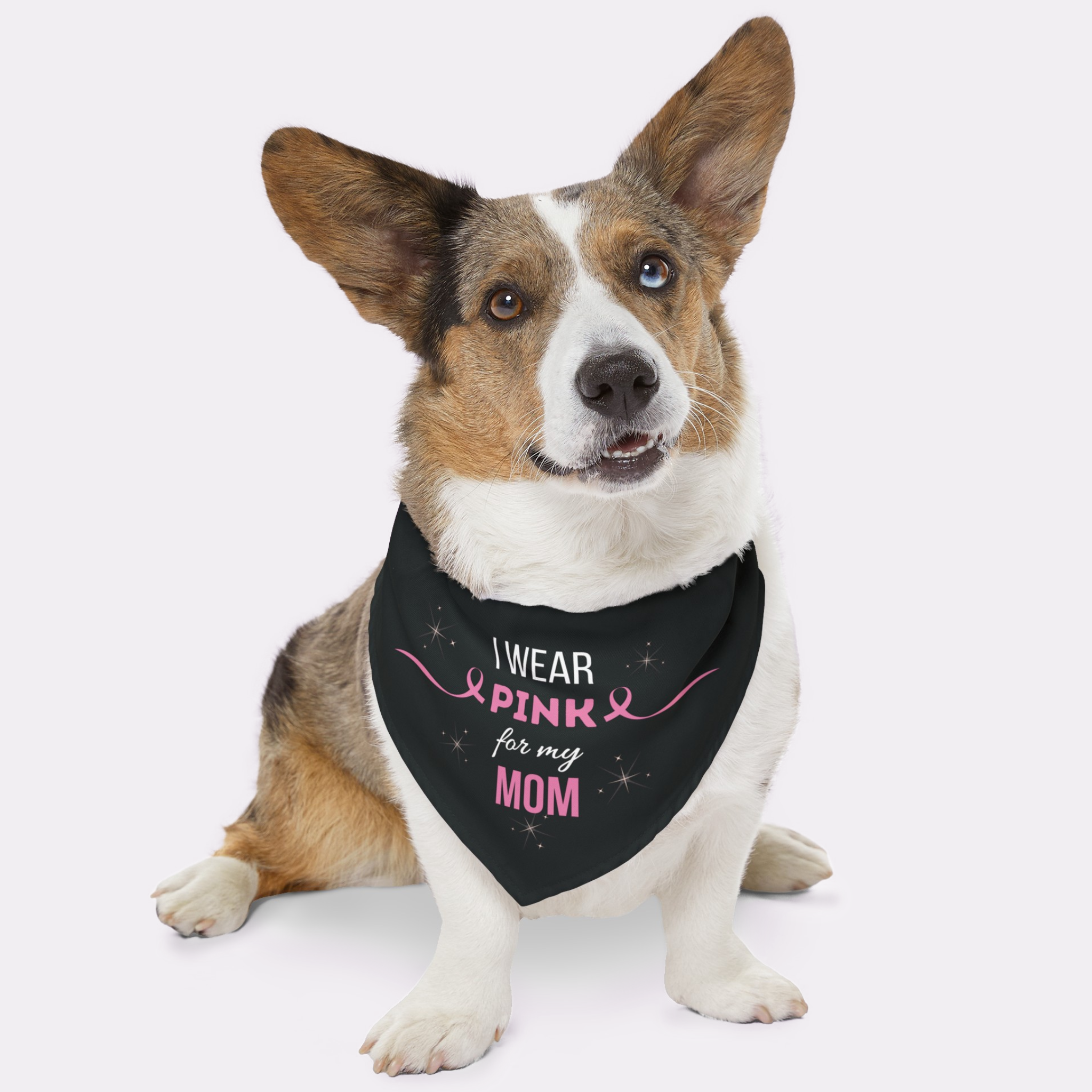 Dog wearing breast cancer  awareness bandana saying I Wear Pink For My Mom.