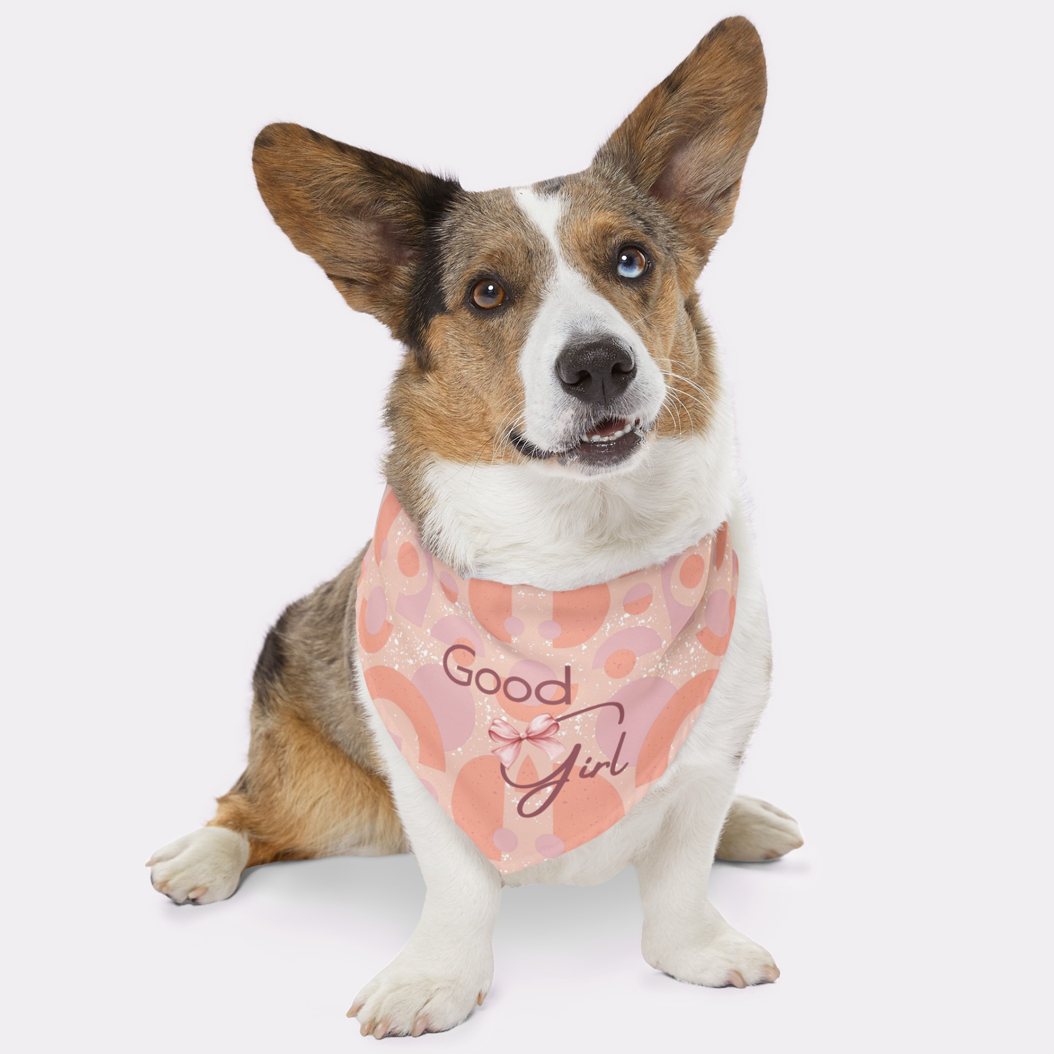 Dog wearing cute pink pattern bandana saying Good Girl.