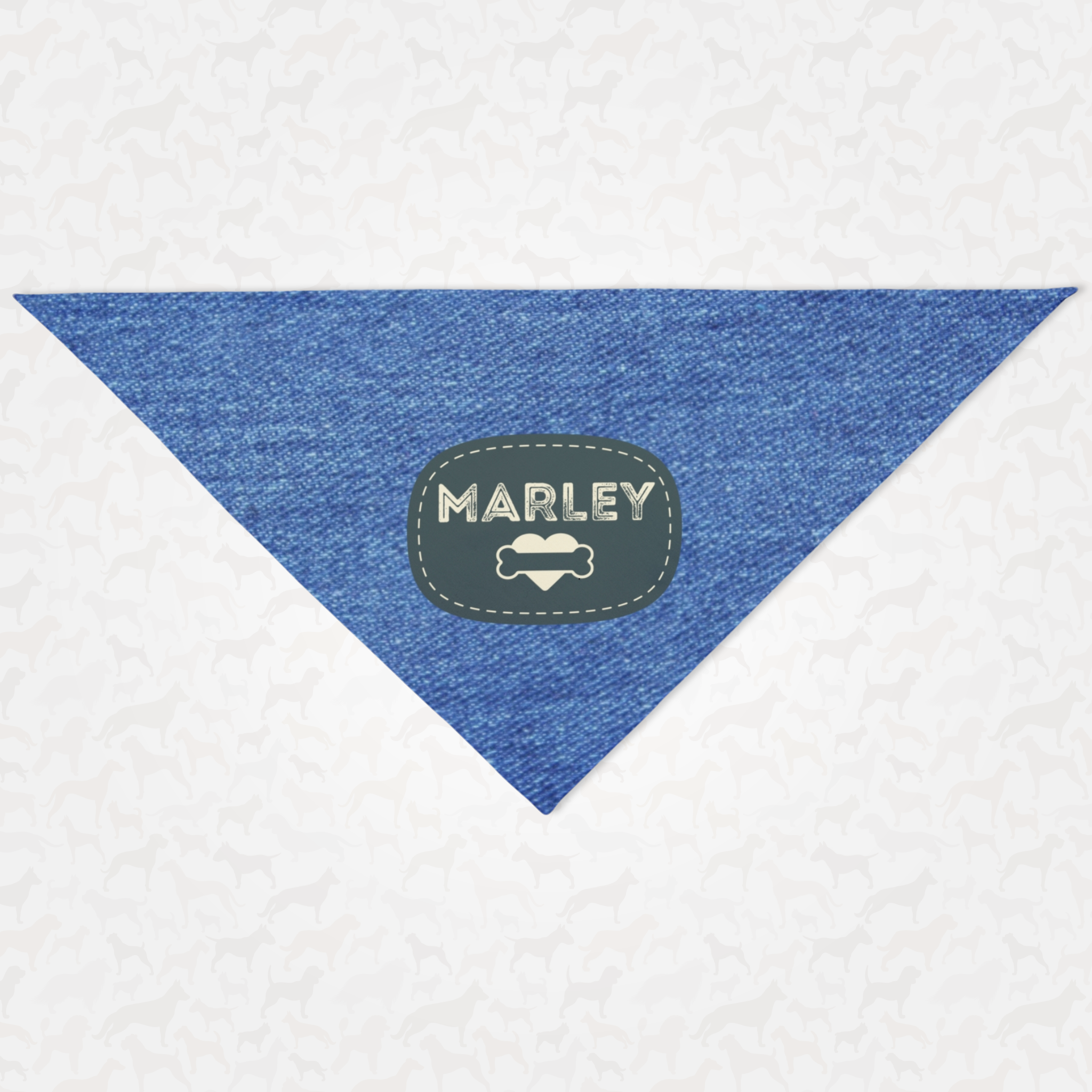 Personalized dog bandana featuring name on badge with a heart and bone graphic on a denim print effect background.