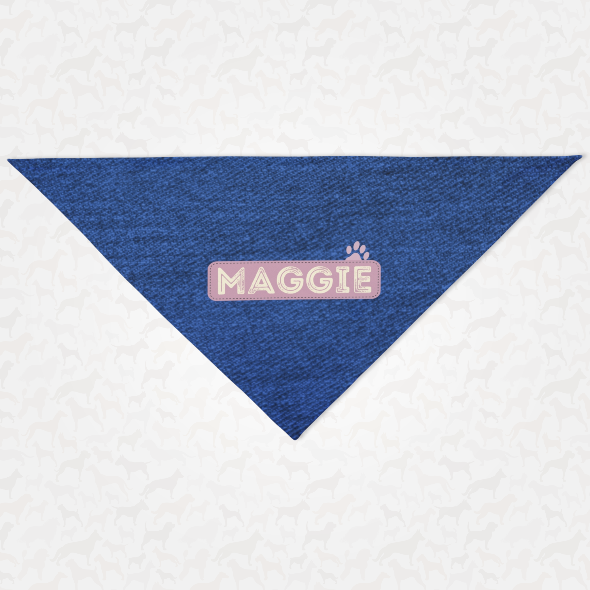 Personalized dog bandana featuring name on pink badge with denim print effect background.